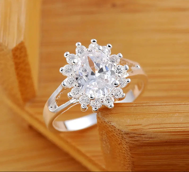 Anello fiore da donna in cristallo e moissanite in argento 925